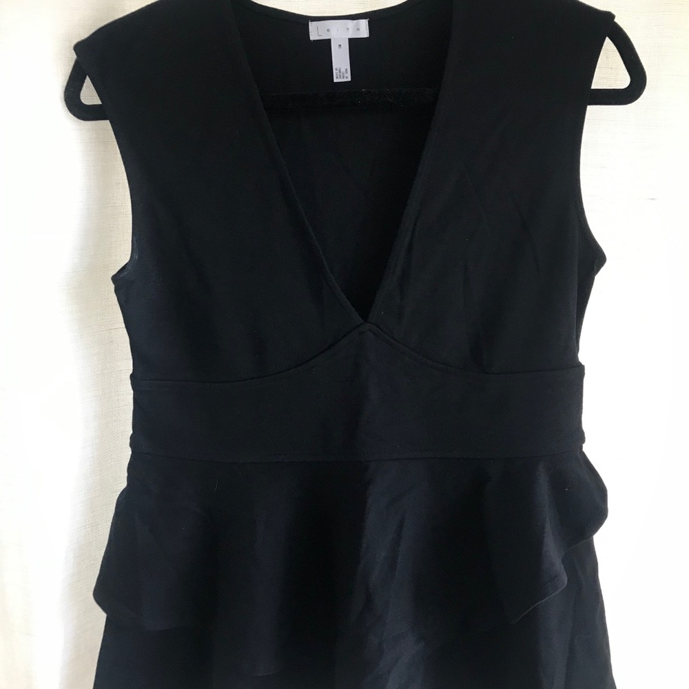 Sleeveless black knit top